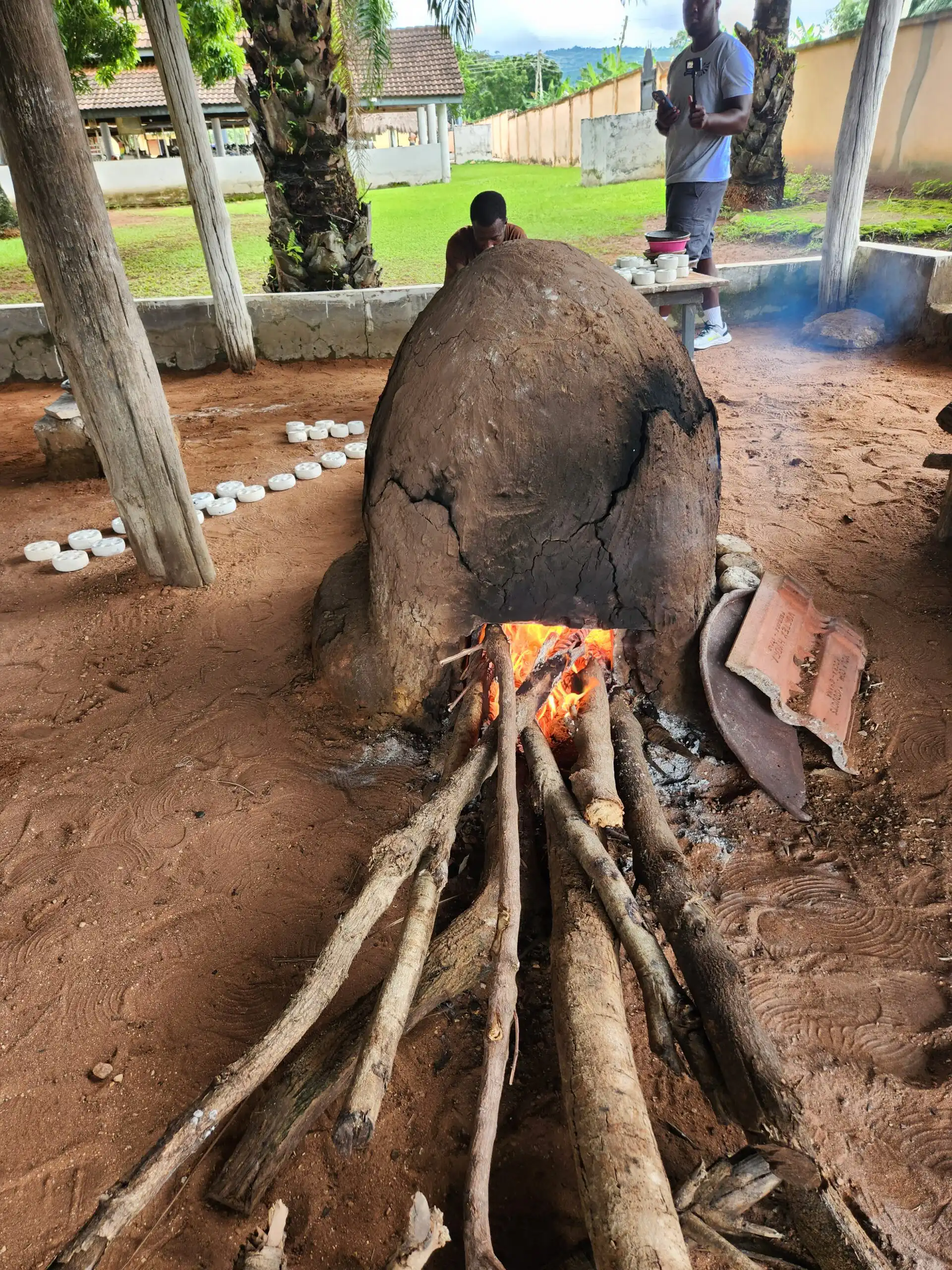 Clay oven with burning wood