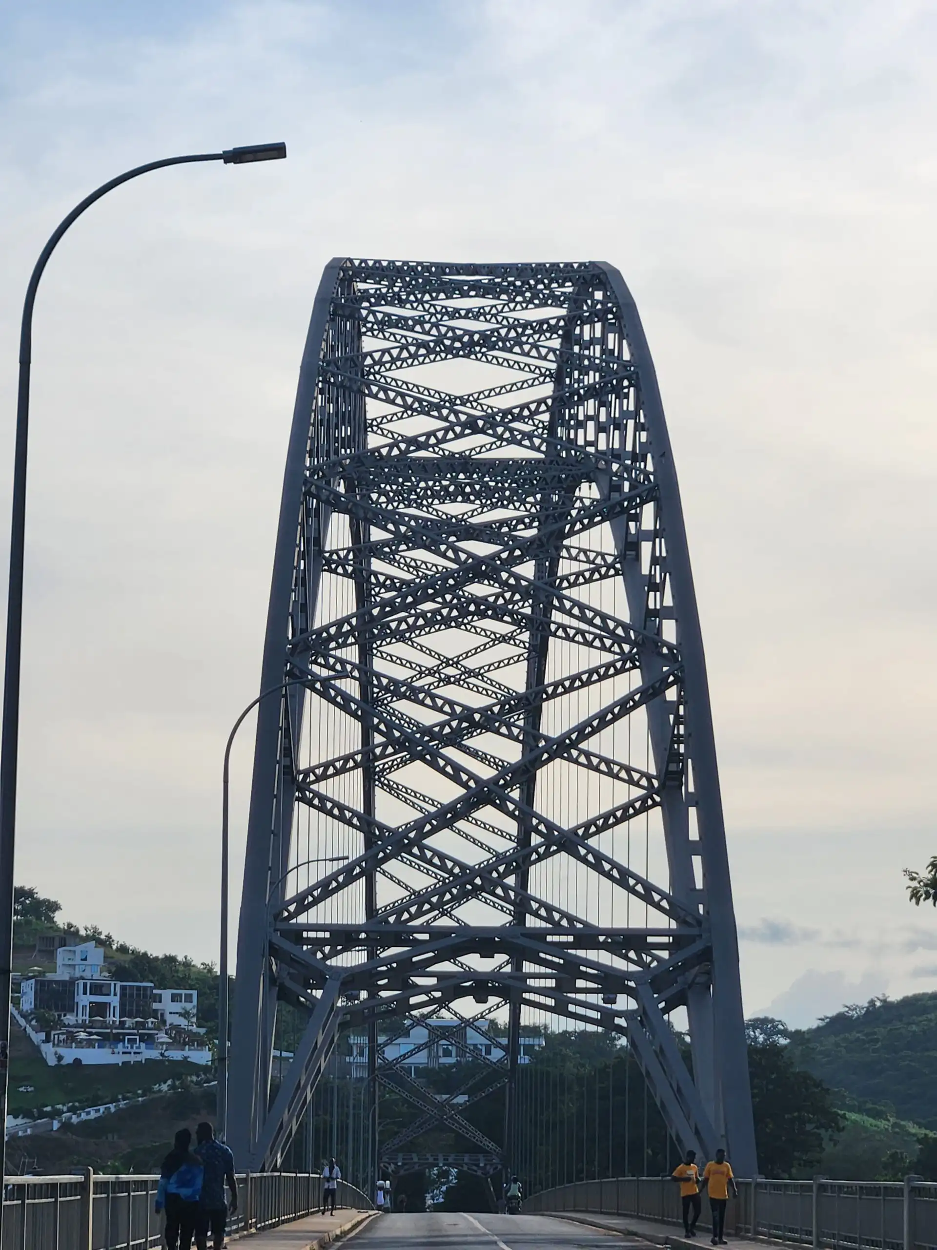 Metal truss bridge spans waterway