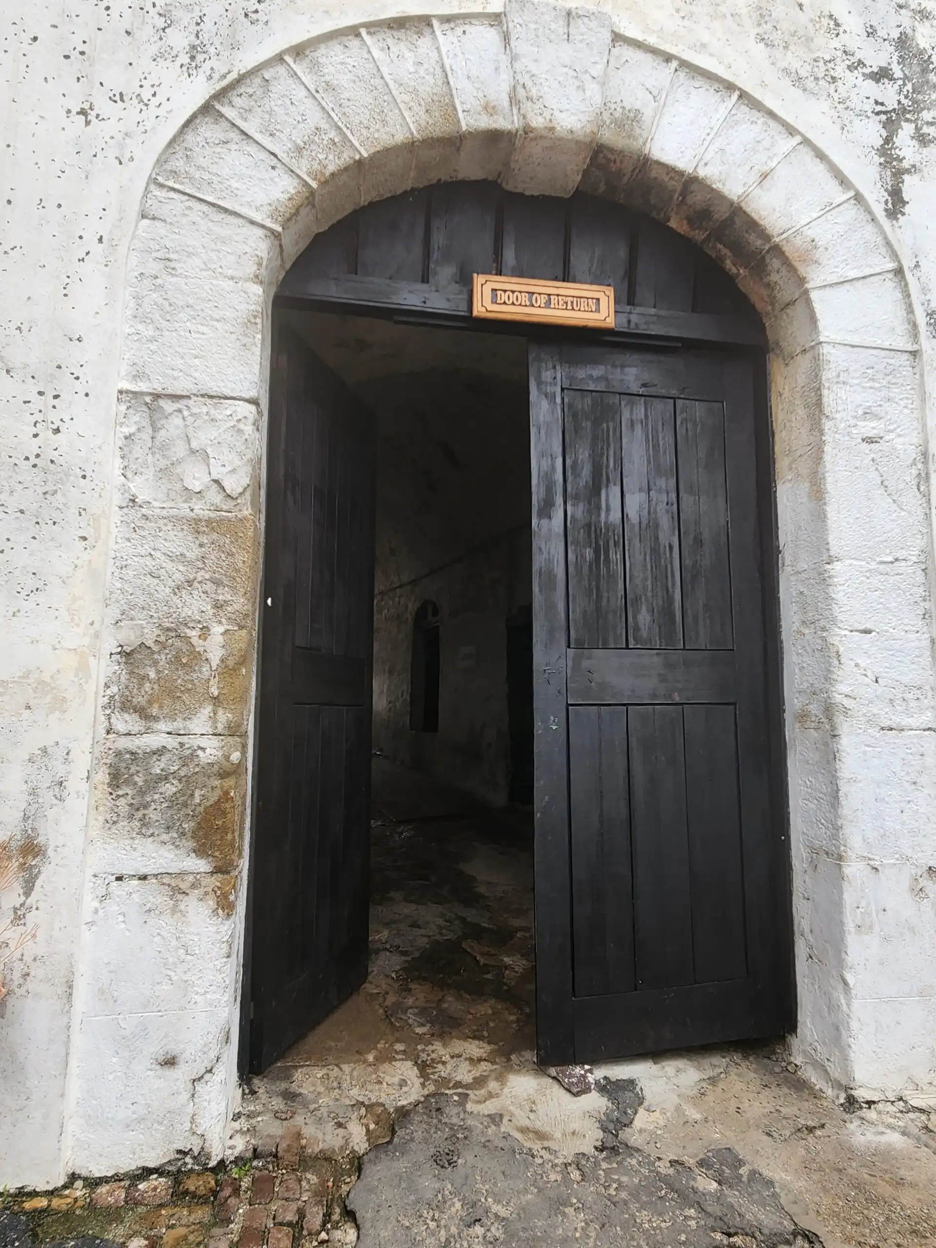 Wooden door with sign
